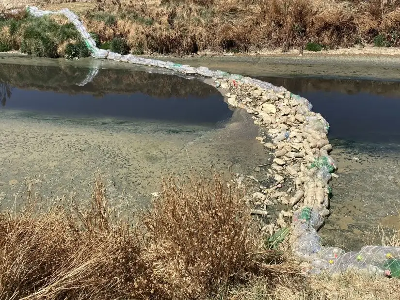 South America - Bolivia - Plastic barrier to collect plastic waste in the Katari River Basin, Bolivia