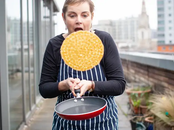 Christine flipping pancake
