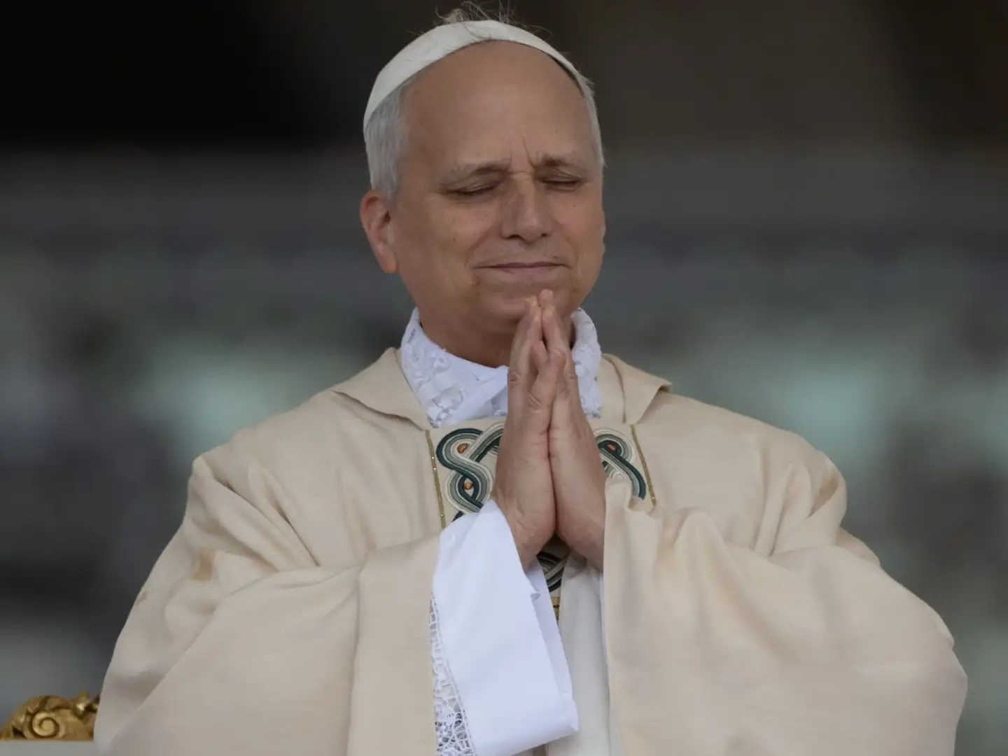 Pope Leo XIV praying