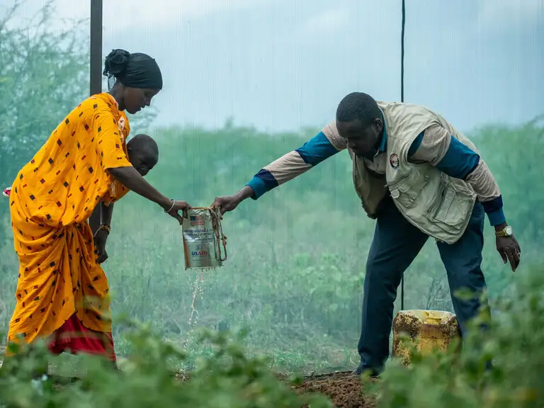 Simon of Cyrene carries the cross