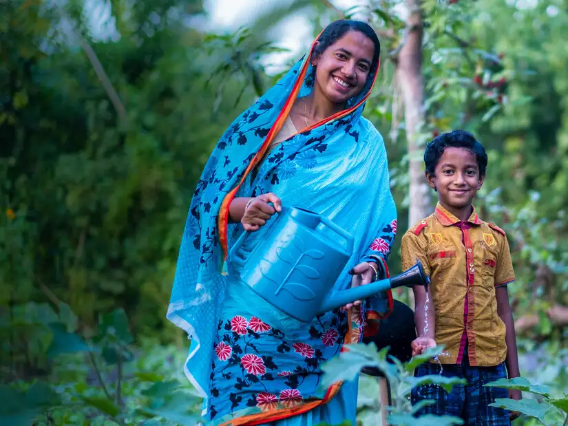 Shukla and her son Fariz in Bangladesh