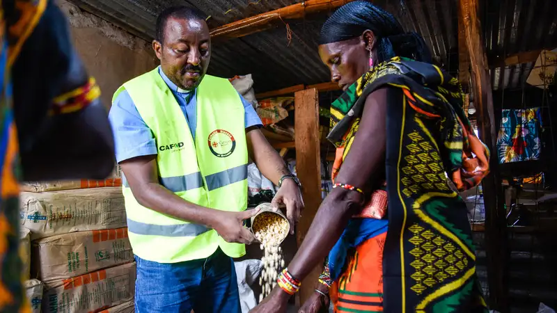kushi receiving food.jpg