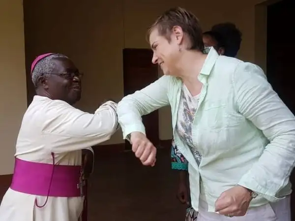 Africa - DR Congo - Christine Allen greeting the Archbishop of Bukavu